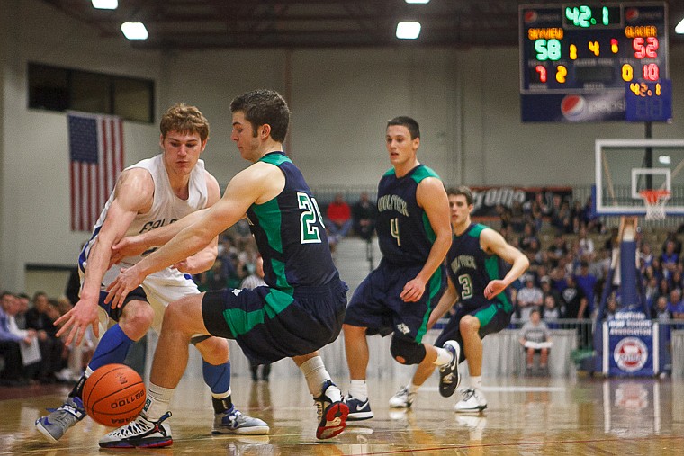 &lt;p&gt;Glacier senior forward Logan Iverson tries to steal the ball from Billings Skyview's Daine Muller (left) Saturday afternoon during the consolation final at the Class AA state basketball tournament at Four Seasons Arena in Great Falls.&#160;&lt;/p&gt;