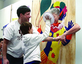 Third graders from Plains elementary school had a class party to celebrate reading and &quot;I Love to Read Month&quot; on Thursday morning.  The top readers from each class threw a plate of whipped cream at willing administrators. Left, superintendent Mr. Thom Chisholm, Treydon Brouillette nailed Mr. Larry McDonald, the principal of Plains High School in the face with a plate.