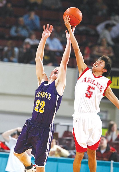 Arlee senior Kyle Felsman, nicknamed &quot;the leaper&quot; by coach Clyde Tucker, wins the opening jump ball against Culbertson.