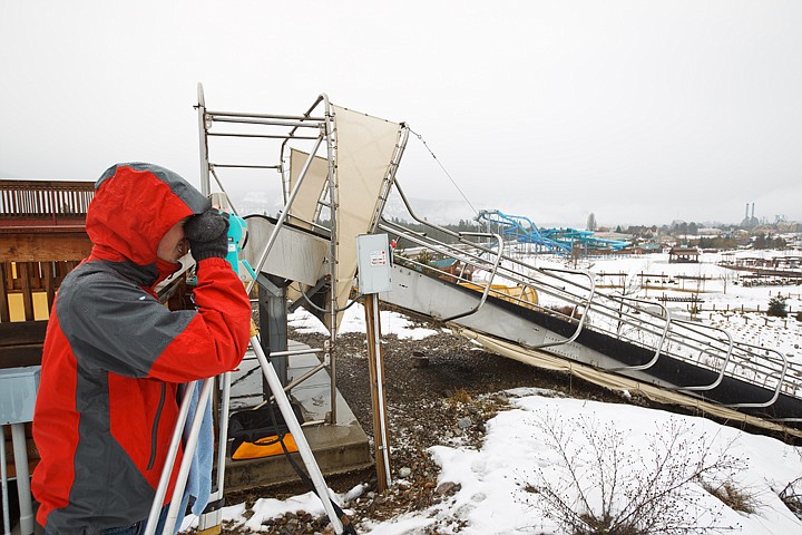 &lt;p&gt;Jake Kilcup, a designer for Rocky Mountain Construction, sights in his survey equipment Wednesday at the site where Silverwood Theme Park has slated a new water feature to be constructed.&lt;/p&gt;