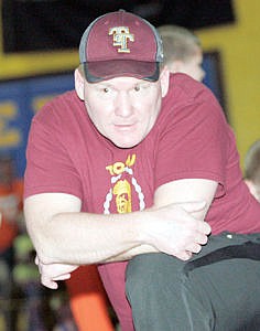 &lt;p&gt;Chris Hermes looks on as his son Marcus readies to make a move on Caleb Mee of Columbia Falls in the Beginner 65 class Saturday during the Kootenai Klassic Little Guy wrestling tournament.&lt;/p&gt;