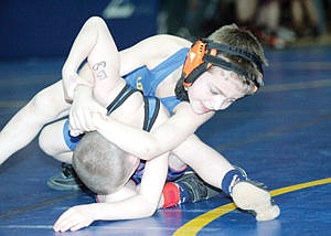 &lt;p&gt;In the Beginner 60 weight class Libby's Ian Thom, 7, works to pin Tyler Jorgenson, 6, of Kalispell during Saturday's Kootenai Klassic Little Guy wrestling tournament.&lt;/p&gt;
