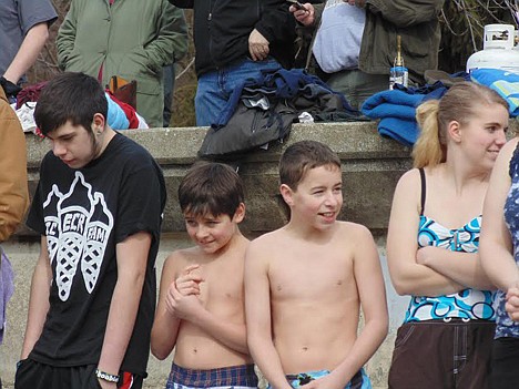 &lt;p&gt;From left, Kayne Vitt, Wyatt Holloway, AJ Curson and Breanna Clemans anxiously await to dive into Lake Coeur d'Alene on Saturday morning during the &quot;Plunging for Pesos&quot; pledge fundraiser at City Beach.&lt;/p&gt;