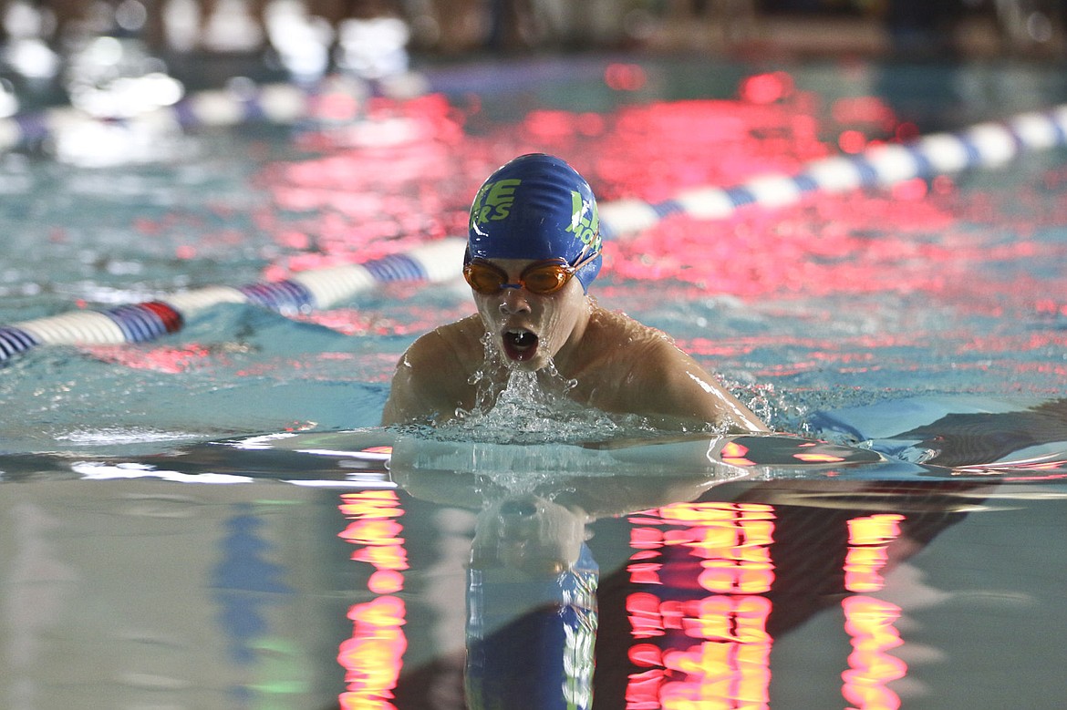 &lt;p&gt;Mason Sloan swims in the 100 yard breaststroke Saturday morning in Polson.&lt;/p&gt;