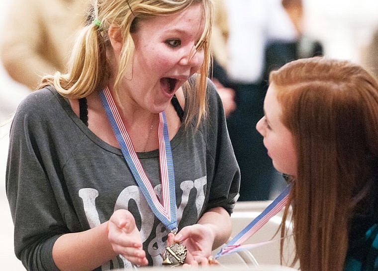 &lt;p&gt;West Valley eighth-grader Tessa Ulberg reacts to receiving a Grand Champion medal Tuesday afternoon during the Flathead County Science Fair in the Expo Building at the Flathead County Fairgrounds.. March 4, 2014 in Kalispell, Montana. (Patrick Cote/Daily Inter Lake)&lt;/p&gt;