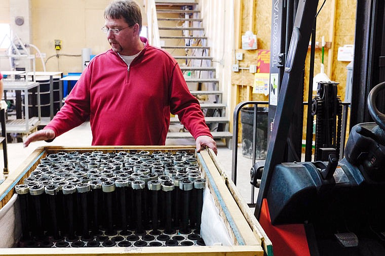 &lt;p&gt;Owner Craig Ruch looks over a crate of finished rifle barrels Tuesday afternoon at Armor Anodizing. March 4, 2014 in Kalispell, Montana. (Patrick Cote/Daily Inter Lake)&lt;/p&gt;