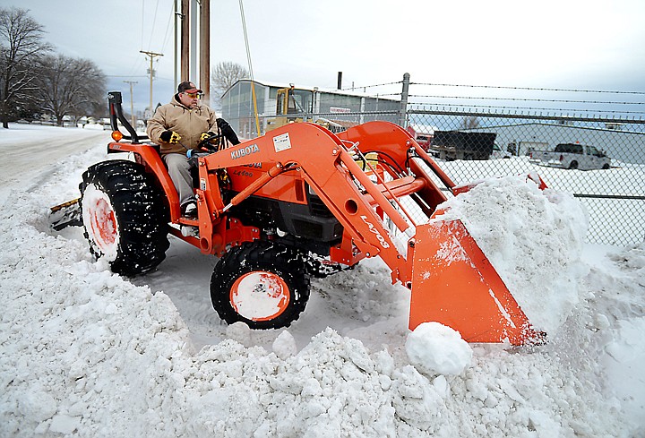 &lt;p&gt;Chip Bondurant of the Flathead County Fairgrounds clears snow from the side walk surrounding the fairgrounds on Monday, March 3, in Kalispell. (Brenda Ahearn/Daily Inter Lake)&lt;/p&gt;