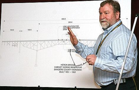 Photo by Adam Herrenbruck Jim Lynch, director of Montana Department of Transportation, explains the design of the Heron Bridge at a public meeting in the community Thursday night.