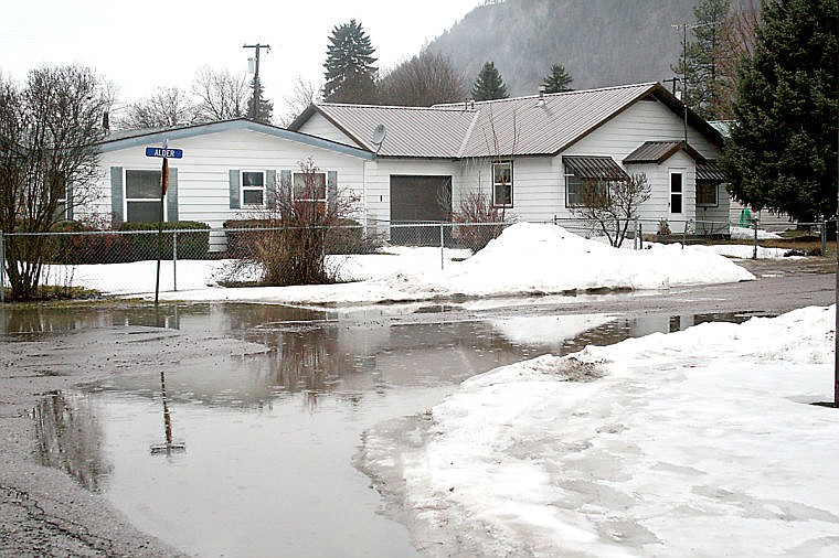 &lt;p&gt;The intersection of Fifth Avenue East and Alder Street in Superior fills with water from rain and melting snow. The competition creates a perfect recipe for flooding throughout the county.&#160;&lt;/p&gt;