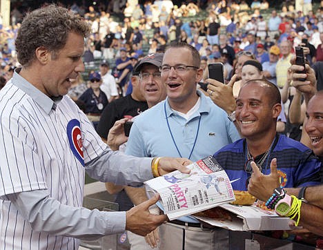 &lt;p&gt;Comedian Will Ferrell, left, talks with fans after throwing out the ceremonial first pitch before a baseball game between the Miami Marlins and the Chicago Cubs in Chicago July 18, 2012.&lt;/p&gt;