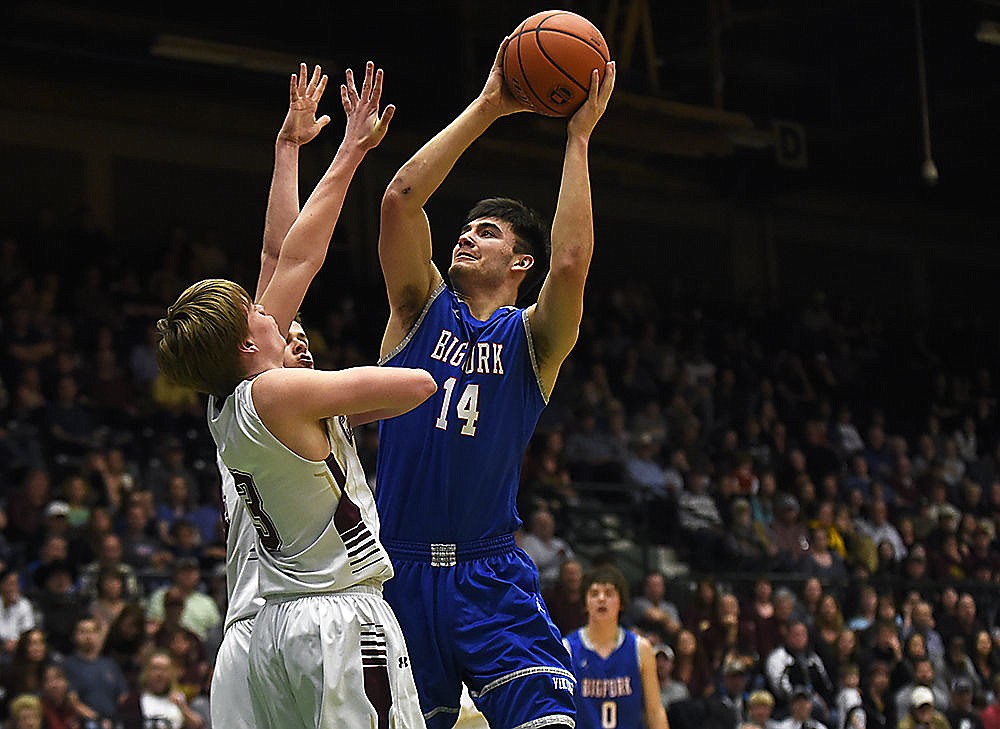 &lt;p&gt;Bigfork&#146;s Jonathan Landon (14) shoots over a pair of Choteau defenders during the Class B state championship game at the Butte Civic Center on Saturday. (Aaric Bryan/Daily Inter Lake)&lt;/p&gt;