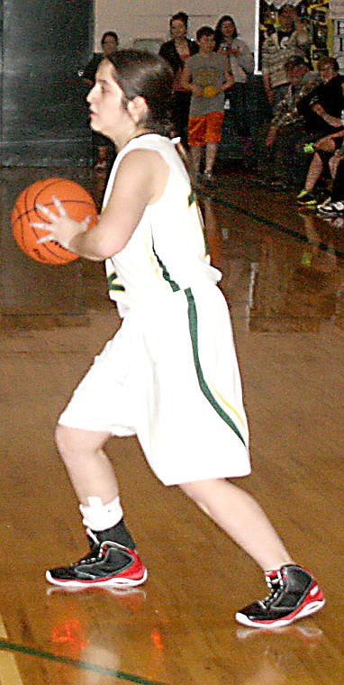 &lt;p&gt;Ashley Cheesman looks for an opening at a St. Regis home game. She played on the team with her sister Courtney.&#160;&lt;/p&gt;