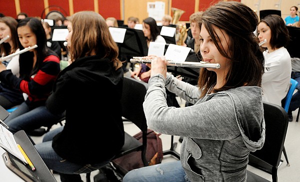 &lt;p&gt;Barrie Sugarman of Flathead and members of the combined Flathead and Bozeman band practices Sanctuary by Frank Ticheli on Monday afternoon in Kalispell. The festival concludes this evening with performances by the Percussion Ensemble, the Flathead/Bozeman band and the Glacier/Capitol band beginning at 7 p.m.&lt;/p&gt;