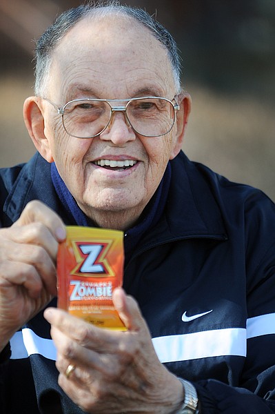 <p>Don "Grumpa" Andersen, who owned Grumpa's Eatin' Barn in Kalispell from 1975 to 1999, displays a packet of the new Grumpa's Zombie Flavoring on Wednesday.</p>