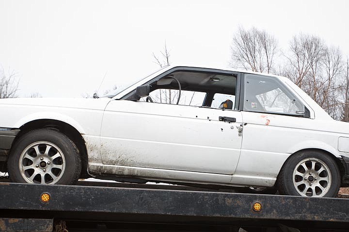 &lt;p&gt;SHAWN GUST/Press The drivers door of the late 1980s model Nissan that was involved in a chase with the Idaho State Police and Post Falls Police Department in the early morning hours Monday shows nearly a dozen bullet holes as the vehicle is transported from the scene. The driver of the coupe was shot and later pronounced dead.&lt;/p&gt;