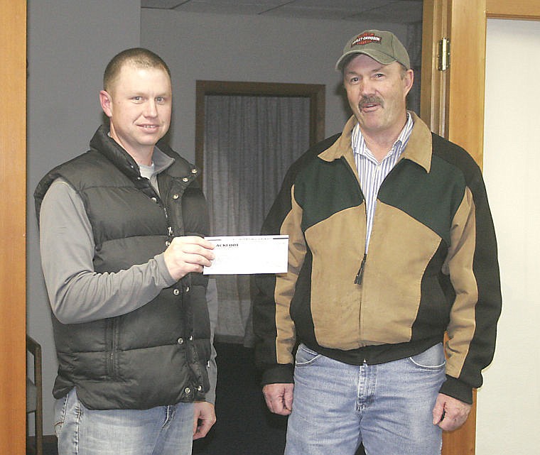 &lt;p&gt;WSA President Cory Ovitt accepts the check from Jim Blush of Blackfoot Communications on March 5.&lt;/p&gt;