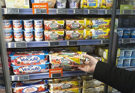 &lt;p&gt;A man takes a yogurt pack from a refrigerator in a supermarket in Paris, Thursday. France's competition authority handed the country's top yogurt makers $203 million in fines Thursday for fixing prices over the course of several years, striking secret deals in hotel rooms and on special phone lines created to avoid detection.&lt;/p&gt;