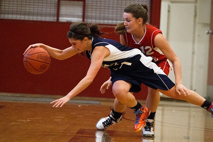 &lt;p&gt;Tori Davenport, with the Idaho girls North All Star team dives for a loose ball as the South's Carrie Thibault collides with her Saturday in the second half at North Idaho College.&lt;/p&gt;