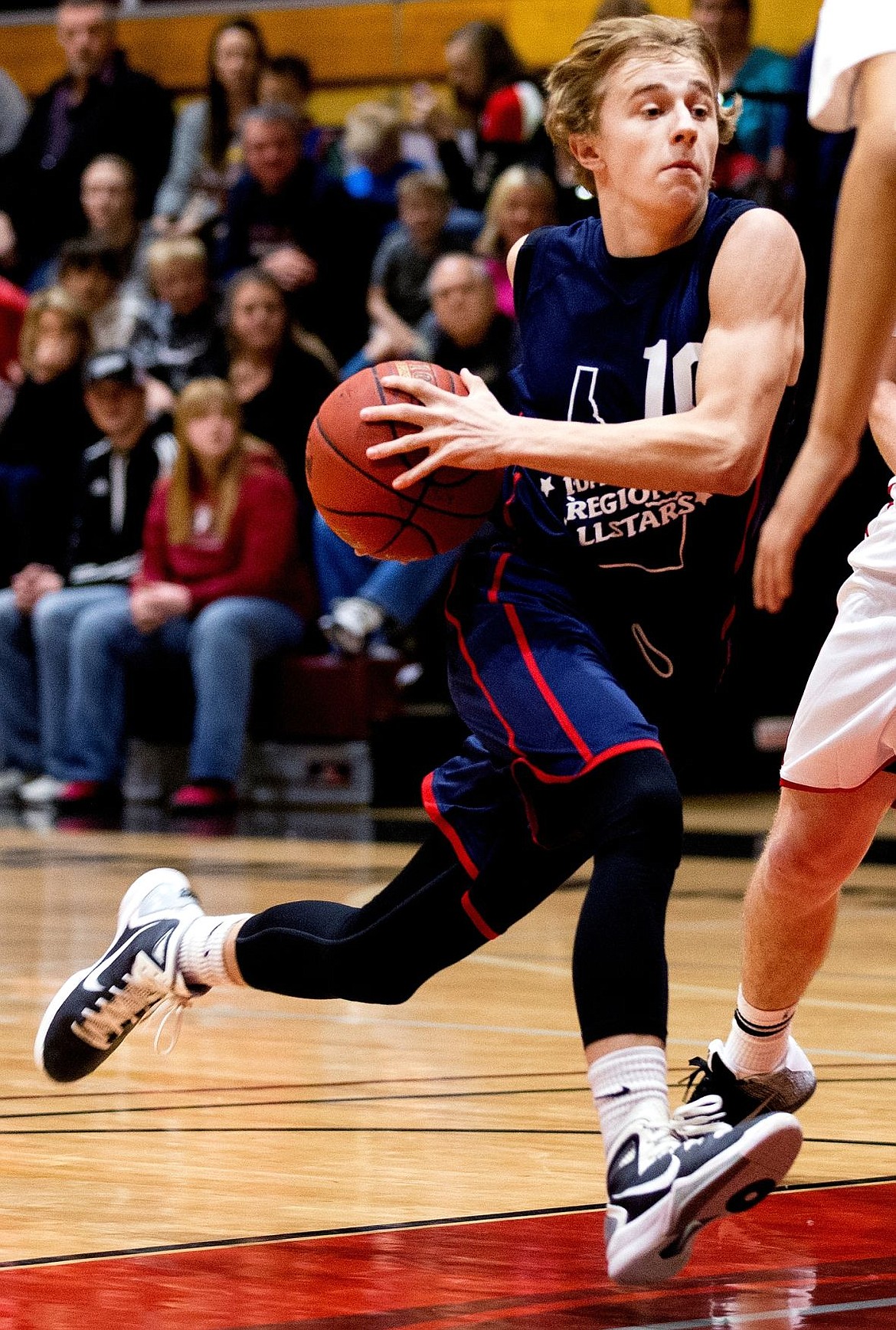 &lt;p&gt;JAKE PARRISH/Press Region's Jakob Lynn, of Coeur d'Alene High School, drives to the basket at the 13th Annual High School All Star Game on Saturday at North Idaho College. Lynn later broke his right arm in the game.&lt;/p&gt;