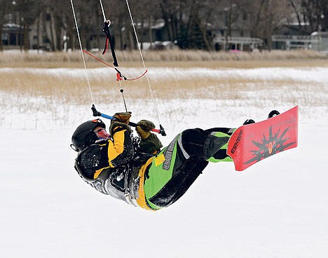 &lt;p&gt;Jerry Sandell catches some air while while snowkiting on Pearl Lake near Marty, Minn., Feb. 20.&lt;/p&gt;