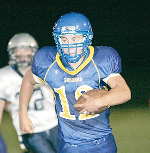 &lt;p&gt;Senior quarterback Jared Winslow on a keeper for a first down in fourth quarter vs. Anaconda.&lt;/p&gt;