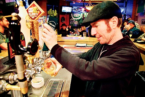 &lt;p&gt;Issac Foelber pours a beet at Kelly's Irish Pub.&lt;/p&gt;