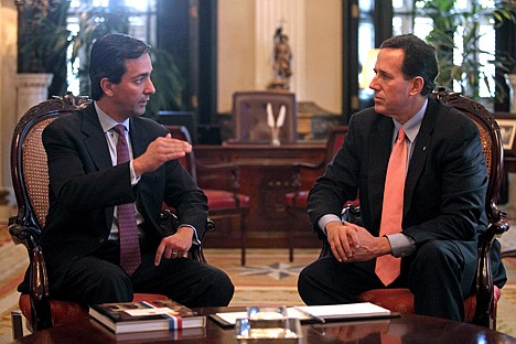 &lt;p&gt;Commonwealth of Puerto Rico Governor Luis Fortuno, left, talks to Republican presidential candidate, former Pennsylvania Sen. Rick Santorum during their meeting at the governor's mansion La Fortaleza, or Fortess, in San Juan, Puerto Rico, Wednesday March 14, 2012. (AP Photo/Dennis M. Rivera Pichardo)&lt;/p&gt;