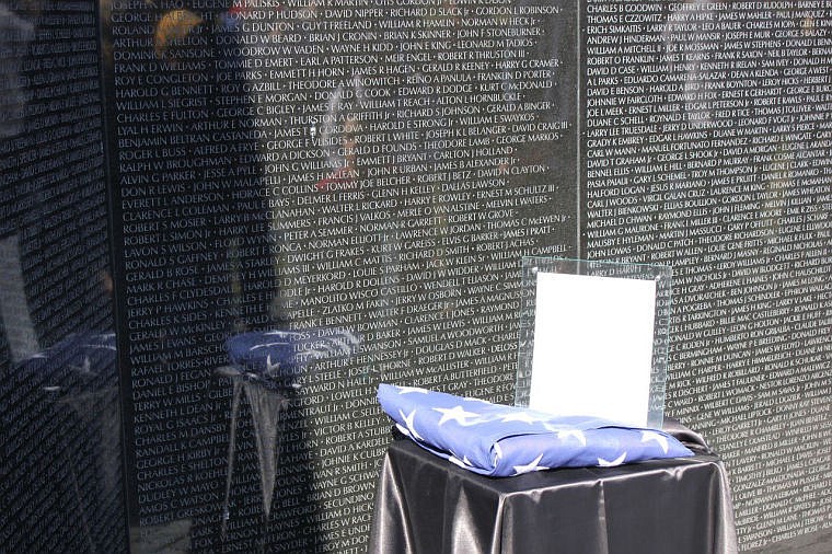 &lt;p&gt;Members of the Shannon family and friends are reflected Friday in the Vietnam Veterans Memorial Wall where 1st Lt. Kenneth Arthur Shannon&#146;s name is engraved. A color guard presented the flag and U.S. Rep. Steve Daines, R-Mont., read a letter written by Laron &#147;D&#148; Shannon on the 49th anniversary of Lt. Shannon&#146;s death. The day also marked the beginning of Marine Corps boot camp training for Lt. Shannon&#146;s son, Colin.&lt;/p&gt;