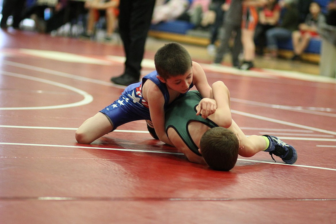 &lt;p&gt;Superior wrestler Gage Rausch, top, takes on an opponent from Bonner.&lt;/p&gt;