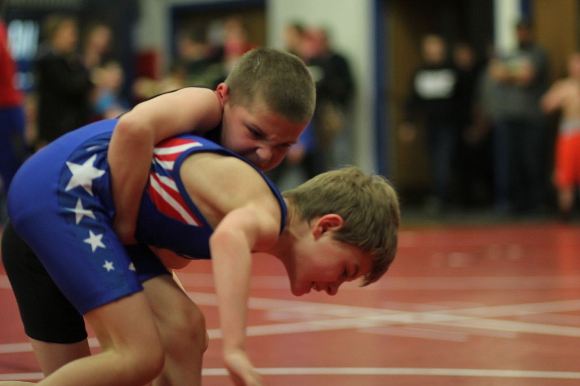 &lt;p&gt;Superior wrestler Micah Acker, front, holds off opponent at the Unit 3 Valley Tournament in Superior on Saturday.&lt;/p&gt;