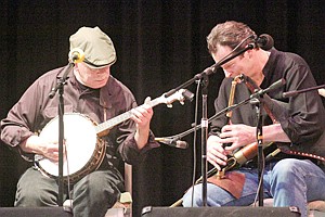 &lt;p&gt;Flotating Crowbar's Don Thomsen on banjo and James Hunter on uilleann pipes, complete with safety belt and air bag.&lt;/p&gt;