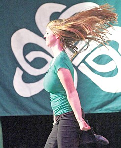 &lt;p&gt;Moriah Probert of the Sole Expressions Dancers kicks up her heals during Libby's 17th Annual Irish Fair Sunday evening at the Memorial Center.&lt;/p&gt;