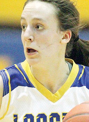 &lt;p&gt;Freshman Jayden Winslow brings the ball down court on a fast break second quarter vs. Eureka Feb 18.&lt;/p&gt;