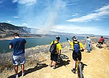 Colorado fire burns in wild winds, threatens homes