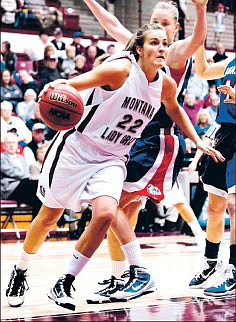 &lt;p&gt;University of Montana's Katie Baker, a former standout at Lake City High, moves into the key during a matchup with Gonzaga earlier this season. Montana opens the women's NCAA tournament Saturday against UCLA in Spokane.&lt;/p&gt;