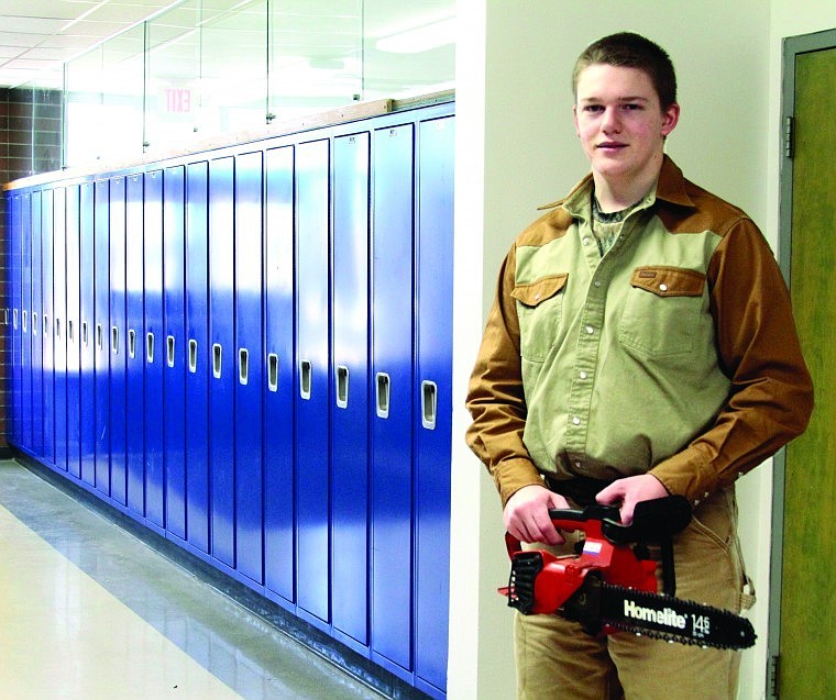 Dusty Dettwiler, 18, of Heron, demonstrated chain saw safety for his 4-H presentation on Saturday at Thompson Falls High School.