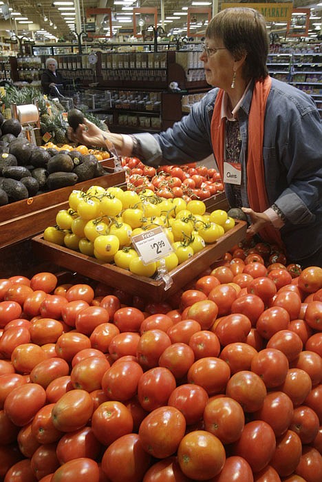 &lt;p&gt;Connie Booth picks out and avocado while shopping at a Kroger Co. supermarket, in Cincinnati on March 1. Wholesale prices jumped last month by the most in nearly two years due to higher energy costs and the steepest rise in food prices in 36 years.&lt;/p&gt;