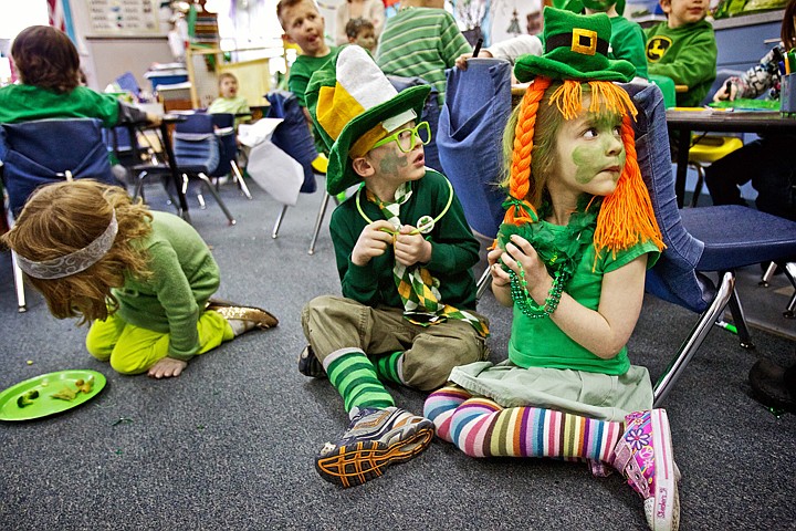 &lt;p&gt;JEROME A. POLLOS/Press Kate Murray, right, and Luke Neary, dressed in their best St. Patrick's Day attire, wait for instructions from their teacher Wednesday at KinderMagic in Coeur d'Alene. Kindergarten students donned everything green for their classroom celebration of St. Patrick's Day complete with a &quot;green feast&quot; for lunch, Irish jigs and songs.&lt;/p&gt;