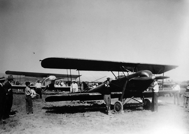 &lt;p&gt;Tom Perry poses with his plane at the dedication of Kalispell City Airport on July 3, 1929.&lt;/p&gt;