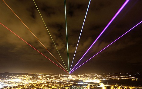 &lt;p&gt;The Global Rainbow is projected into the night sky from Scrabo Tower, Newtownards, Northern Ireland, Friday. The large scale outdoor laser projection created by New York artist Yvette Mattern is visible across the night sky, the event signals 100 days to go until the opening of the London 2012 Festival which is a tweleve-week festival of arts running parallel to the Olympic Games taking place in London.&lt;/p&gt;