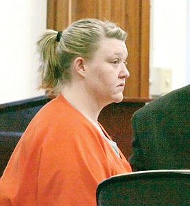 <p>Sarah Sullivan being arraigned before Judge James Wheelis 2-23-15.</p>