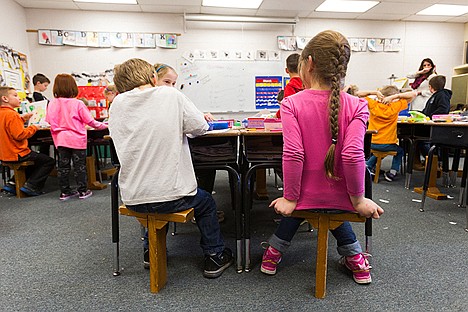 &lt;p&gt;Wiggly first-graders like O.T. Emory, left, and Skye Sijan are prompted to settle down when using t-chairs compared to traditional classroom seats.&lt;/p&gt;