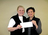 Lady Lions donate big bucks to local causes