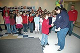 Third graders donate $2,100 to community