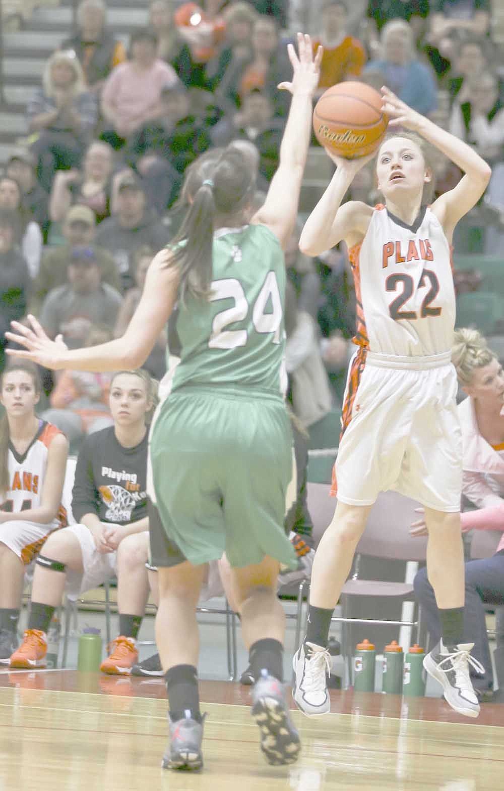 &lt;p&gt;Carley VonHeeder shoots over a Columbus defender Friday afternoon in loser out action at the girls' Class B state tournament in Great Falls. In 1987, her father, Derek VonHeeder competed in the same arena during the boys' state tournament for the Plains Horsemen. &#160;&lt;/p&gt;