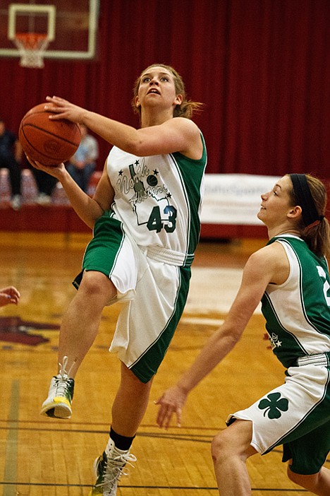 <p>The girls North all-star team's Cieana Close drives to the hoop in the second half at NIC.</p>