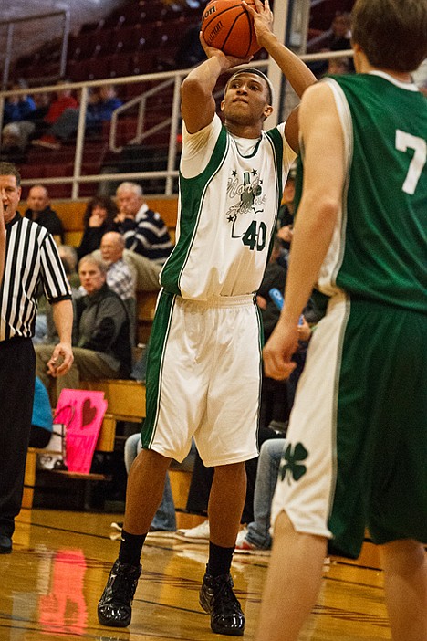 <p>Deon Watson, guard for the boys North all-star team, puts a three-point shot in the first half.</p>