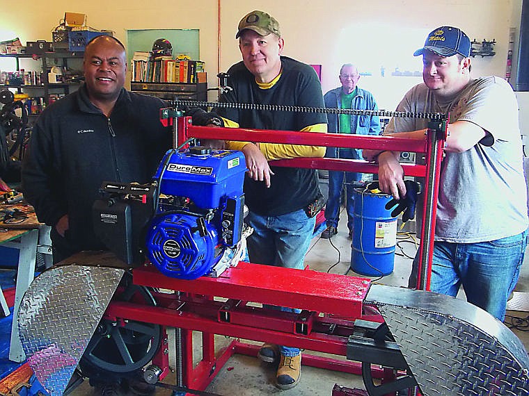 &lt;p&gt;Emosi Tatukivei, Pastor Jim Sinclair and Ken Saner show off the sawmill. The mill will help benefit the village on isalnd of Moturiki in Fiji.&#160;&lt;/p&gt;