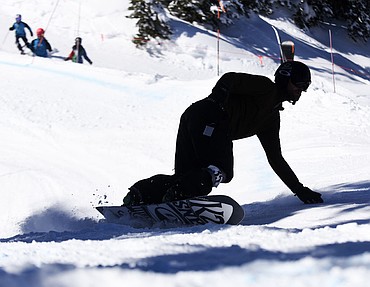 <p>Tyrel Bacon cuts a corner during the Nate Chute Banked Slalom at Whitefish Mountain Resort on Saturday. (Aaric Bryan/Daily Inter Lake)</p>