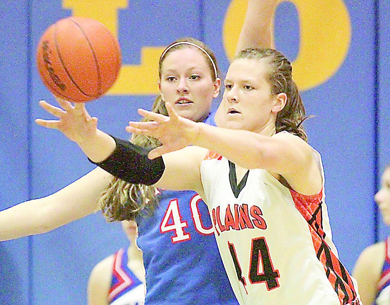 &lt;p&gt;Trotter Leah Thompson passes the ball to a teammate in a game this past season. Thompson plays softball and does track and field in the spring.&lt;/p&gt;